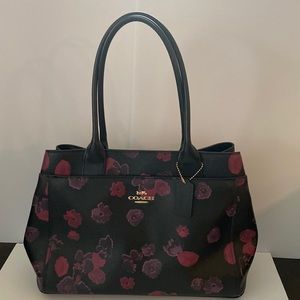 Beautiful floral Coach Satchel purse. Like new condition.